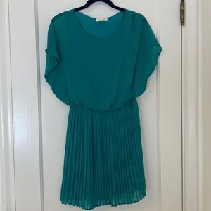 Lush teal dress with pleated skirt